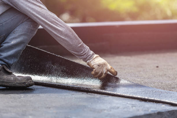 Professional Waterproofing technician working in Lakeland, NY